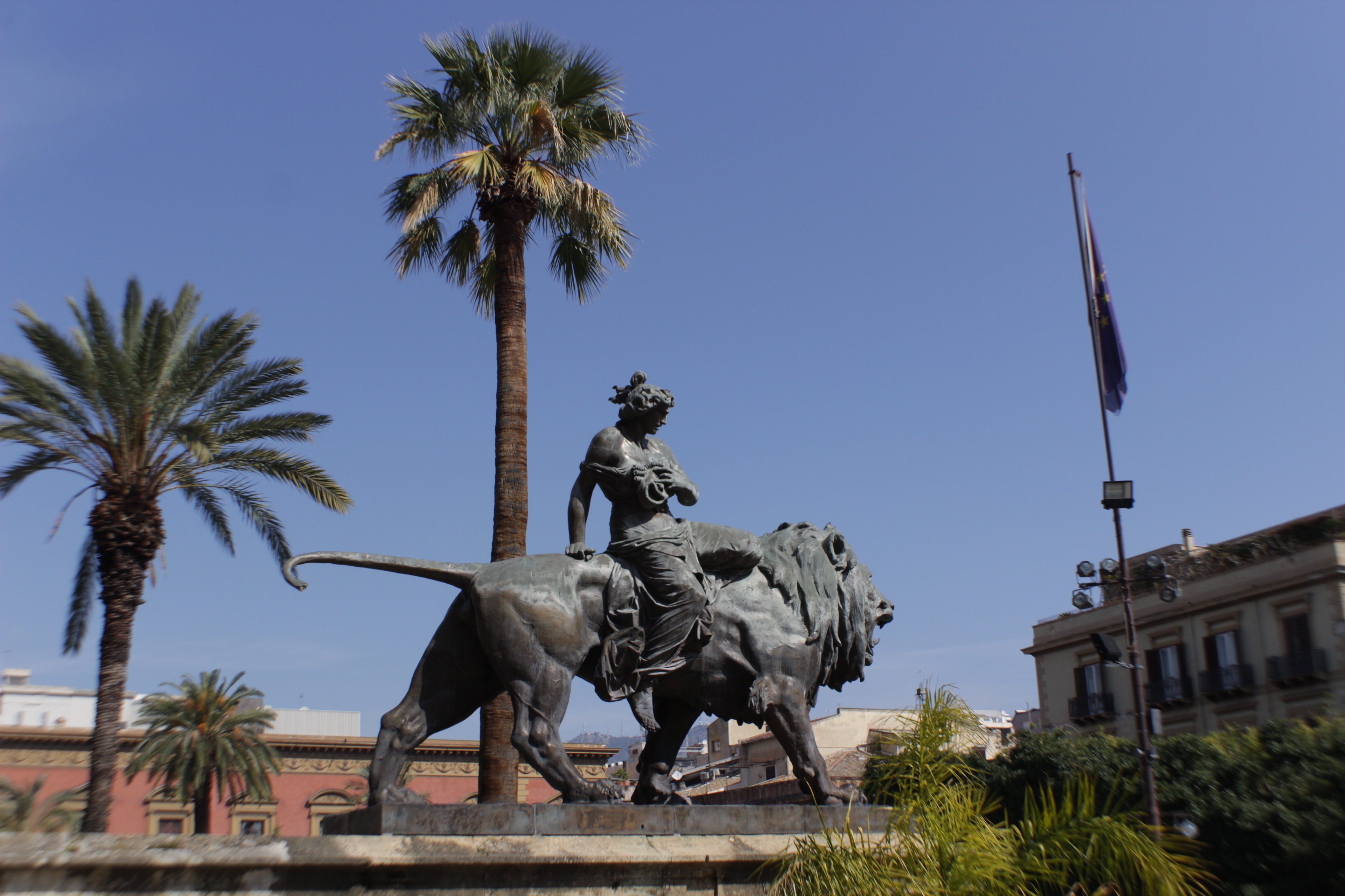 Statue atop a roaring lion